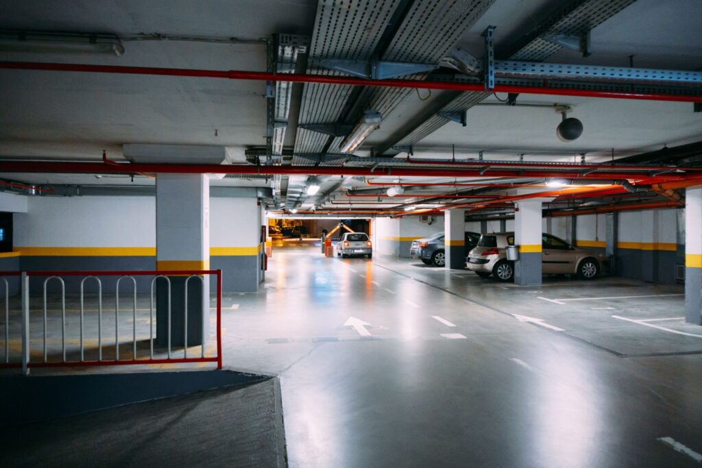 cars-large-heated-underground-parking-lot-with-lighting-min